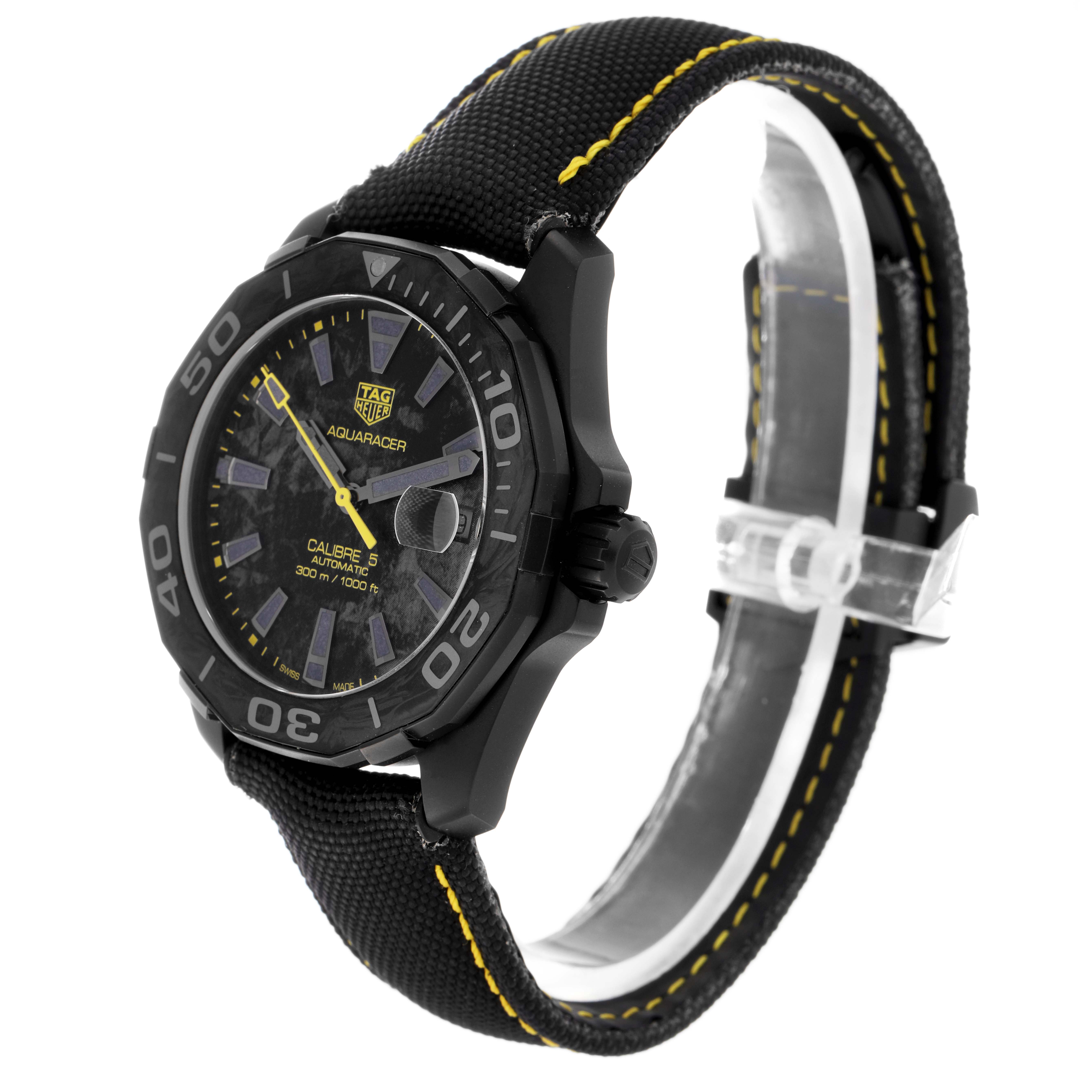 This Tag Heuer Aquaracer WBD218B.FC6446 Men
s Titanium Black Dial WBD218B.FC6446 Men
s Titanium Black Dial watch is shown at a three-quarter angle, highlighting the face, bezel, and black strap with yellow stitching.