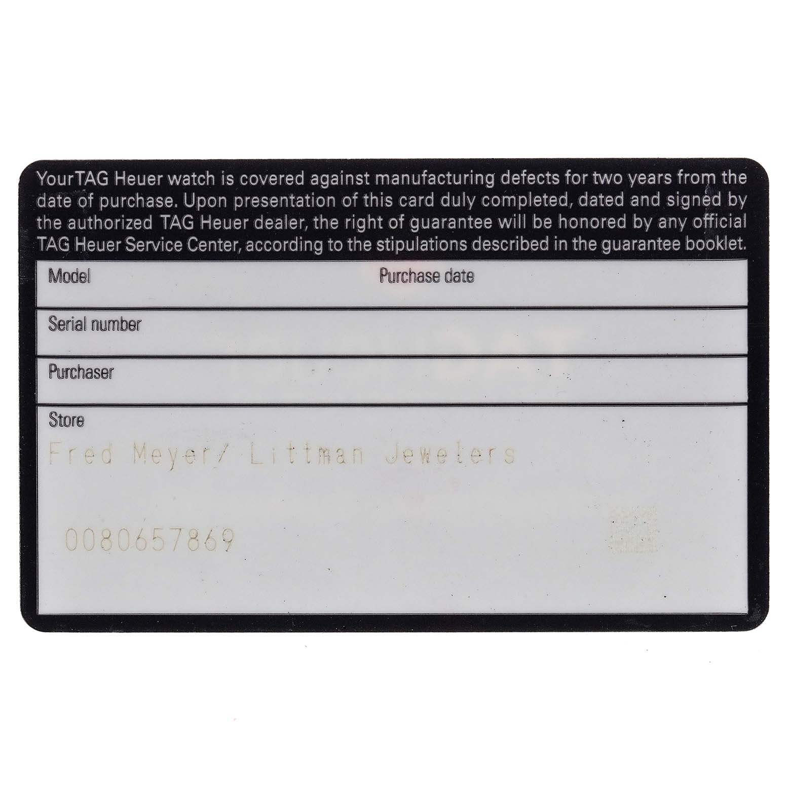 The image shows a TAG Heuer warranty card for a Carrera model watch.