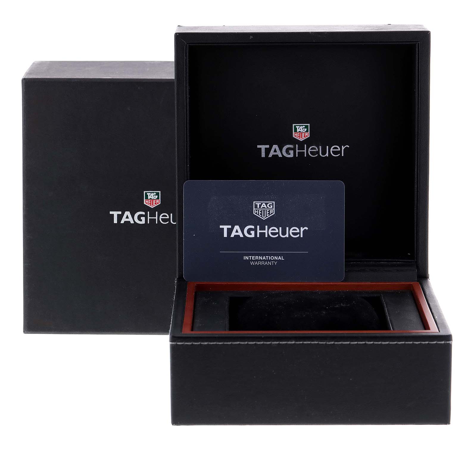 The image shows an open Tag Heuer Carrera CAR2A1J.FC6400 Men's Stainless Steel Transparent Dial CAR2A1J.FC6400 Men's Stainless Steel Transparent Dial watch box with an international warranty card.