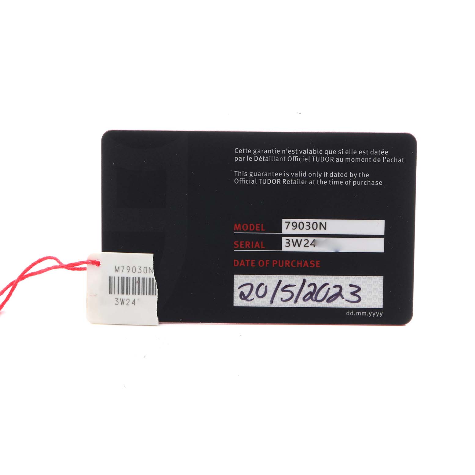 The image shows a warranty card for the Tudor Heritage Black Bay 79030 Men
s Stainless Steel Black Dial 79030 Men
s Stainless Steel Black Dial model, displaying the model and serial numbers.