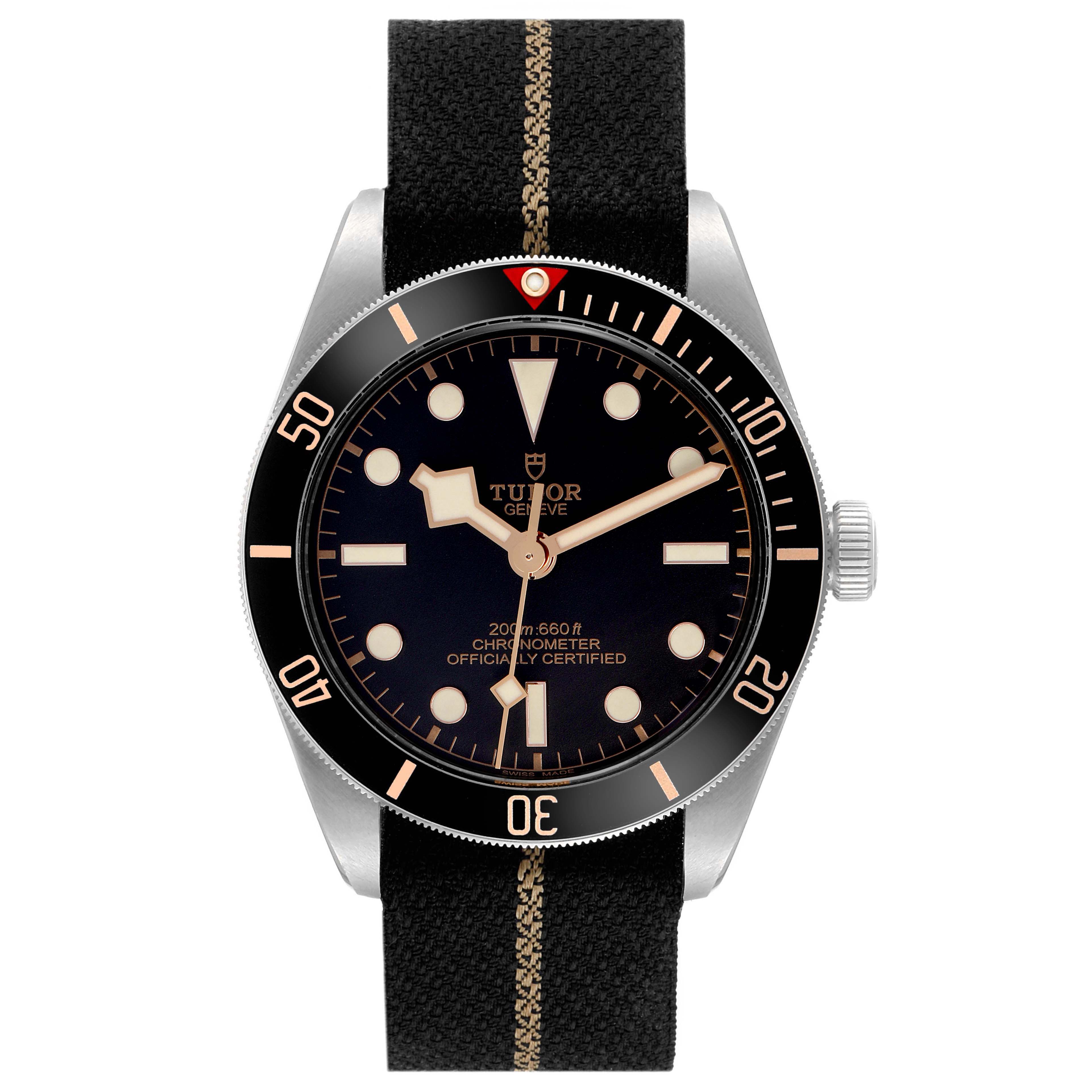 The Tudor Heritage Black Bay 79030 Men
s Stainless Steel Black Dial 79030 Men
s Stainless Steel Black Dial watch is shown front-facing, displaying the dial, bezel, and fabric strap.