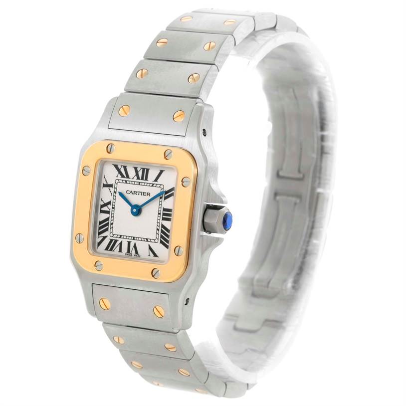 The image shows a Cartier Santos W20012C4 Women
s Stainless Steel Silver Dial W20012C4 Women
s Stainless Steel Silver Dial watch from an angled side view, highlighting its square face, bracelet, and crown.