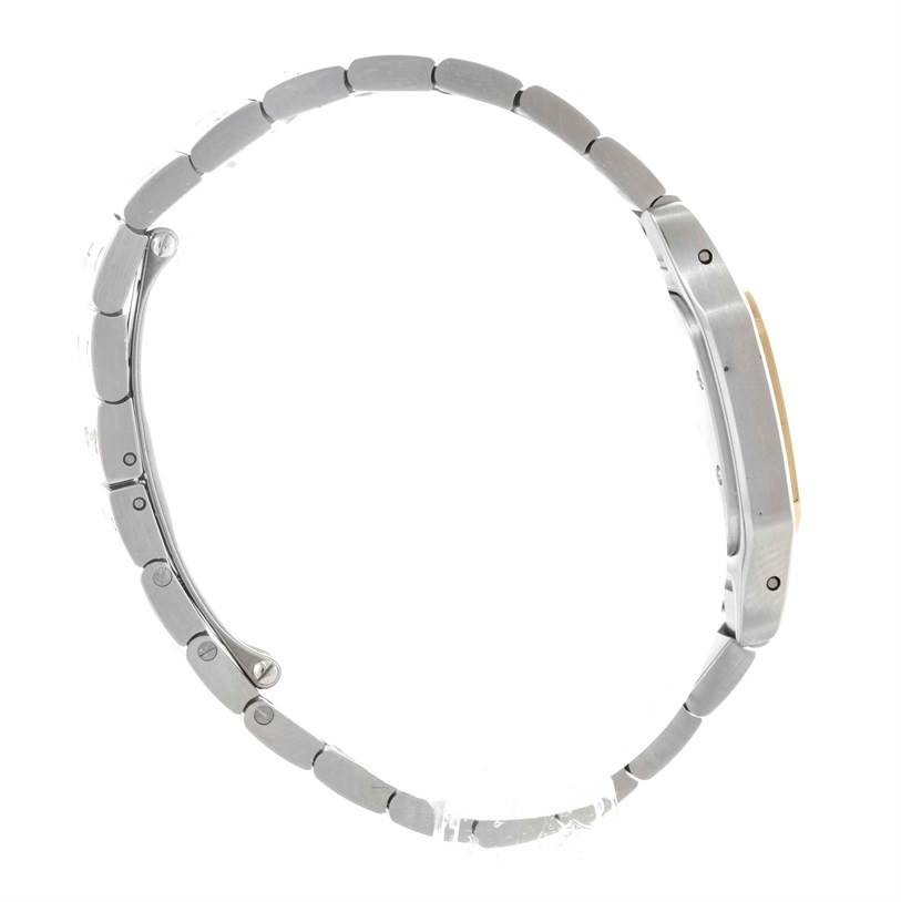 The Cartier Santos W20012C4 Women
s Stainless Steel Silver Dial W20012C4 Women
s Stainless Steel Silver Dial watch is shown from a side view, highlighting its band and case thickness.