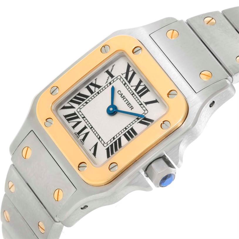 This image shows a partial top and side view of the Cartier Santos W20012C4 Women
s Stainless Steel Silver Dial W20012C4 Women
s Stainless Steel Silver Dial watch, highlighting its face, bracelet, bezel, and crown.