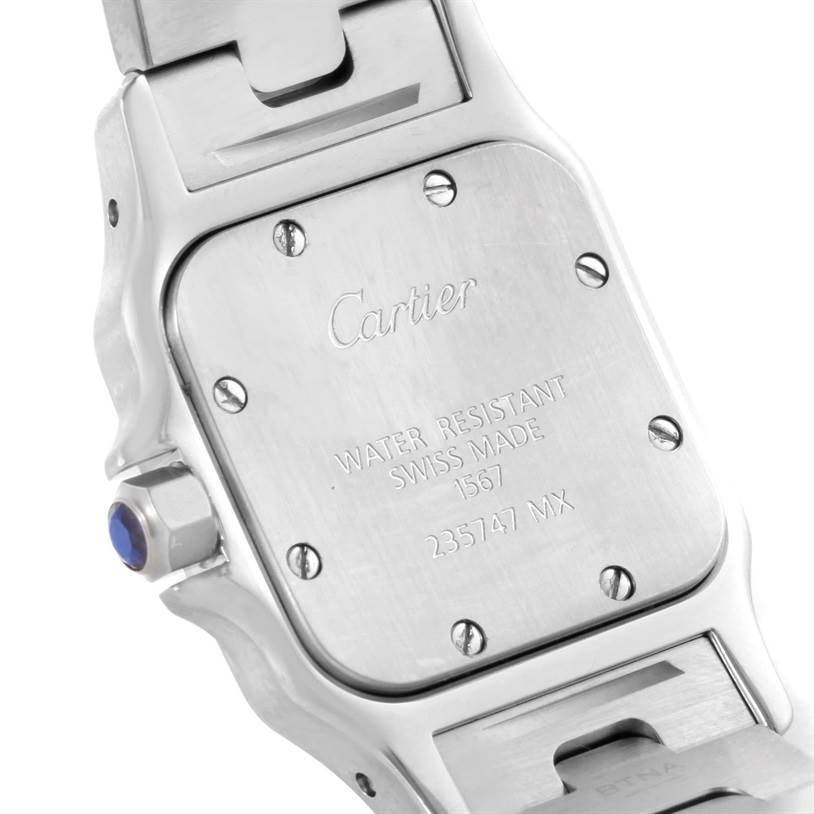 The image shows the case back and part of the bracelet of a Cartier Santos W20012C4 Women
s Stainless Steel Silver Dial W20012C4 Women
s Stainless Steel Silver Dial watch from a rear angle.