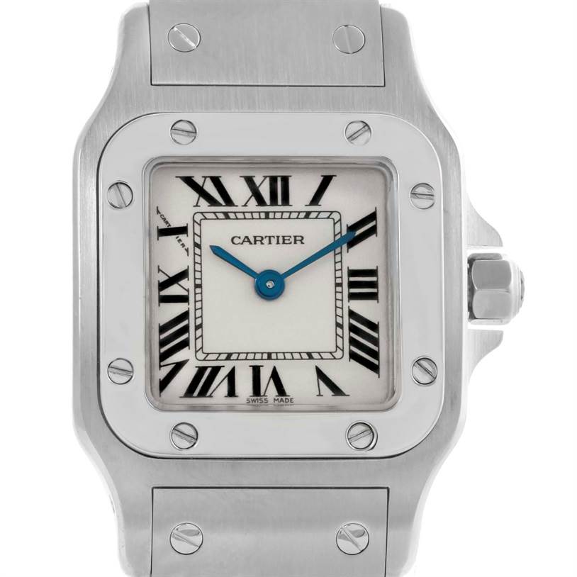 The image shows a frontal view of a Cartier Santos W20056D6 Women
s Stainless Steel Silver Dial W20056D6 Women
s Stainless Steel Silver Dial watch, highlighting its face, bezel, and part of the metal bracelet.