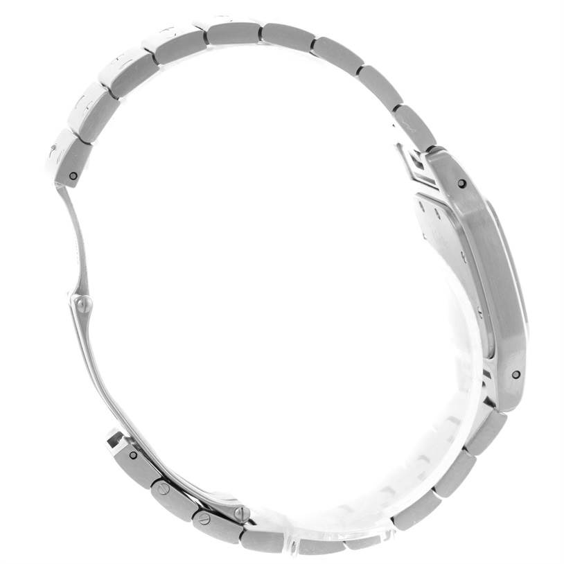 The side view of the Cartier Santos W20056D6 Women
s Stainless Steel Silver Dial W20056D6 Women
s Stainless Steel Silver Dial watch showing the bracelet, case, and clasp.