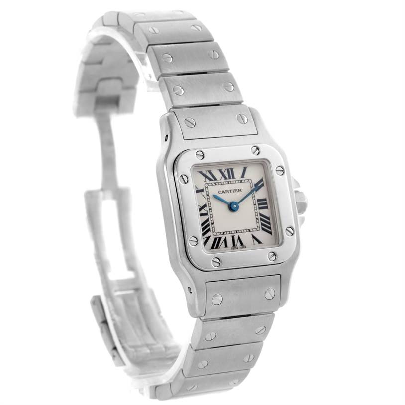 The image displays a Cartier Santos W20056D6 Women
s Stainless Steel Silver Dial W20056D6 Women
s Stainless Steel Silver Dial watch, showcasing the front dial and metal bracelet angled slightly to the left.