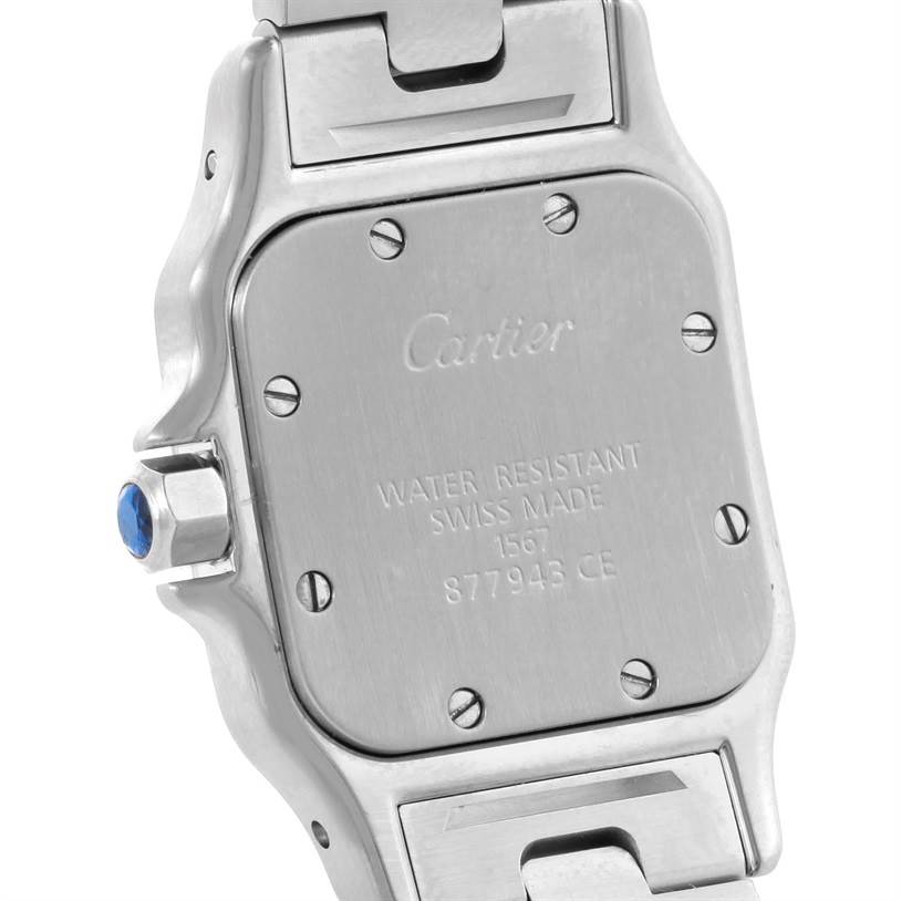 This image shows the back case and part of the bracelet of the Cartier Santos W20012C4 Women
s Stainless Steel Silver Dial W20012C4 Women
s Stainless Steel Silver Dial watch at a slight angle.