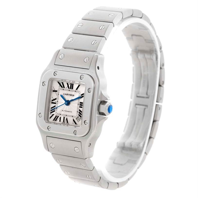 The image shows a Santos model by Cartier at a slight angle highlighting the square face, bezel, bracelet, and crown.