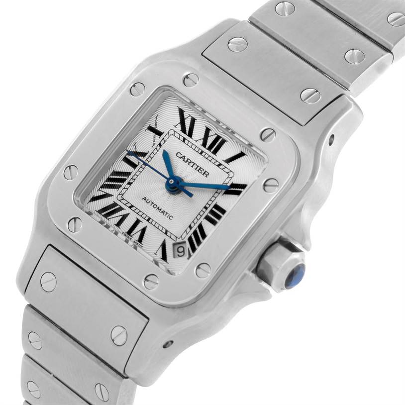 This image shows a close-up angle of the face and part of the bracelet of the Cartier Santos W20054D6 Women
s Stainless Steel Silver Dial W20054D6 Women
s Stainless Steel Silver Dial watch.