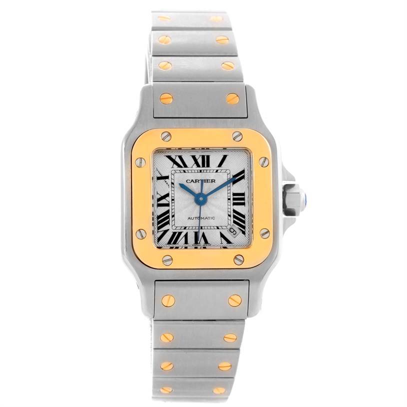 The image shows a frontal view of a Cartier Santos W20057C4 Women
s Stainless Steel Silver Dial W20057C4 Women
s Stainless Steel Silver Dial model watch, featuring a gold bezel and metal bracelet with gold screws.