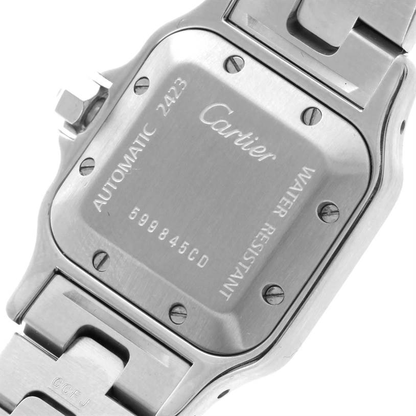 This is a close-up of the back case and part of the bracelet of a Santos model by Cartier.