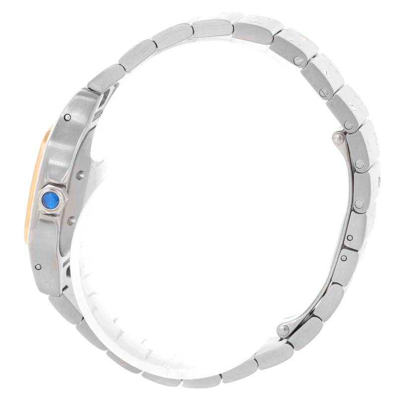 This image shows a side view of the Cartier Santos W20057C4 Women
s Stainless Steel Silver Dial W20057C4 Women
s Stainless Steel Silver Dial watch, highlighting the case, crown, and bracelet.