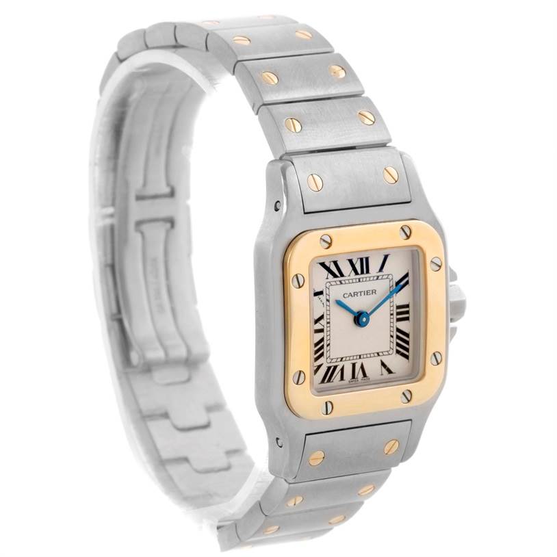 This is a Santos model by Cartier shown at a right-side angle, highlighting the case, bezel, bracelet, and dial.