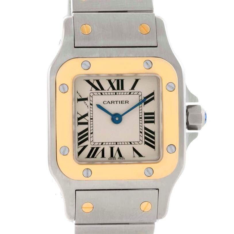 This image shows a front view of the Cartier Santos W20012C4 Women
s Stainless Steel Silver Dial W20012C4 Women
s Stainless Steel Silver Dial watch, highlighting the dial, bezel, and part of the bracelet.