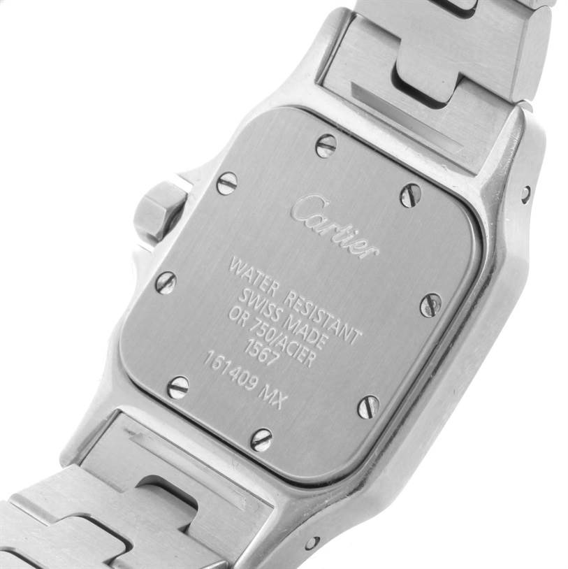 This image shows the back case and part of the bracelet of a Cartier Santos W20012C4 Women
s Stainless Steel Silver Dial W20012C4 Women
s Stainless Steel Silver Dial watch.