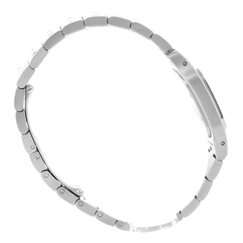 The image shows a side view of a Santos model by Cartier, displaying the watch
s bracelet and case thickness.