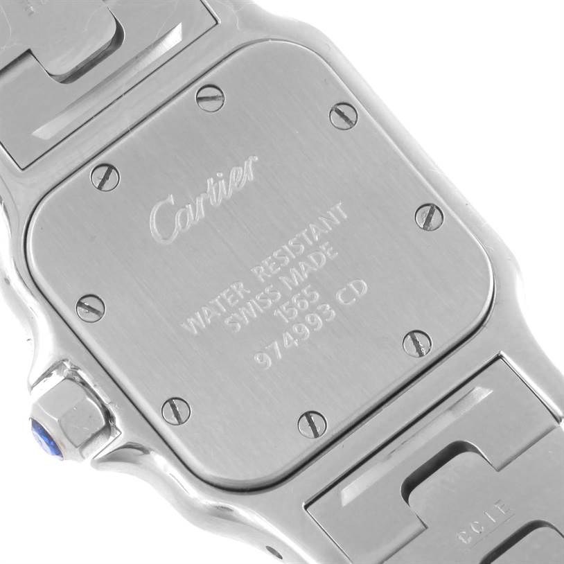 This image shows the back case and part of the bracelet of a Cartier Santos W20056D6 Women
s Stainless Steel Silver Dial W20056D6 Women
s Stainless Steel Silver Dial model watch.