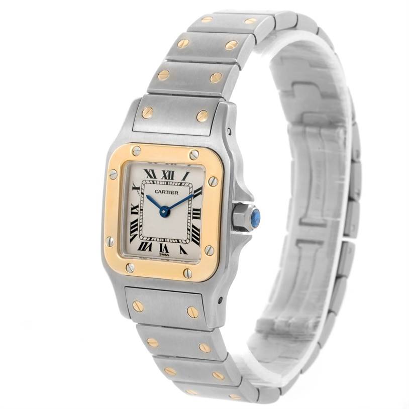 This image shows a Santos model by Cartier from a front angle, highlighting the watch face, bezel, bracelet, and crown.