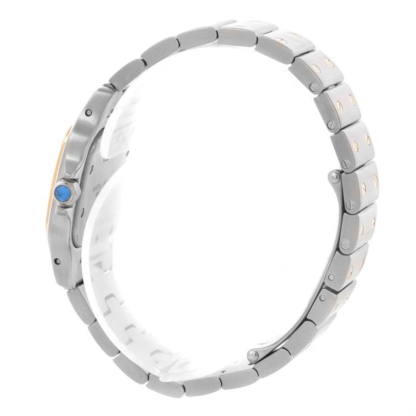 The image shows the side profile and bracelet of the Cartier Santos W20012C4 Women
s Stainless Steel Silver Dial W20012C4 Women
s Stainless Steel Silver Dial watch, including the crown with a blue gem.