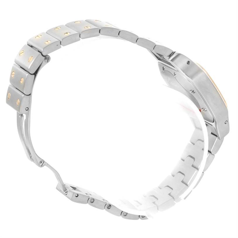 The image shows a Cartier Santos W20057C4 Women
s Stainless Steel Silver Dial W20057C4 Women
s Stainless Steel Silver Dial model watch from a side angle, highlighting its bracelet and part of the case.