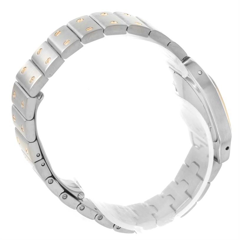 This image shows a side profile angle of the Santos model bracelet by Cartier, highlighting its metal links.
