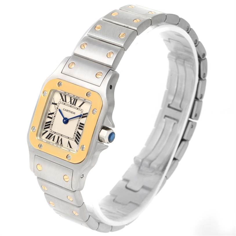 The image shows a Cartier Santos W20012C4 Women
s Stainless Steel Silver Dial W20012C4 Women
s Stainless Steel Silver Dial watch angled to display the face, bezel, and bracelet.