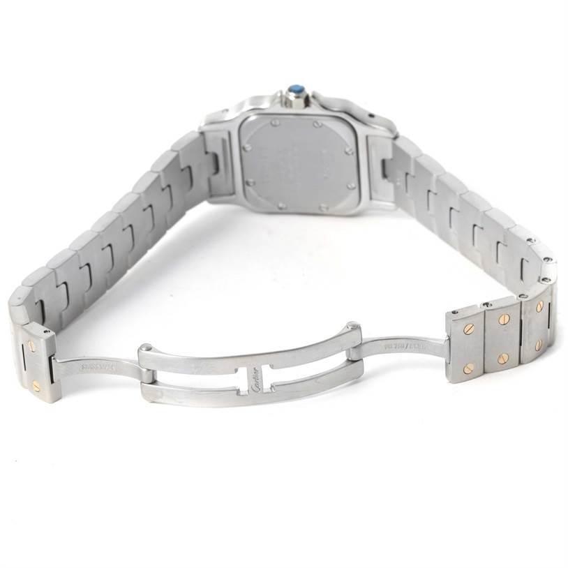 The image shows the Cartier Santos W20012C4 Women
s Stainless Steel Silver Dial W20012C4 Women
s Stainless Steel Silver Dial watch from the back, highlighting the bracelet and the open clasp.