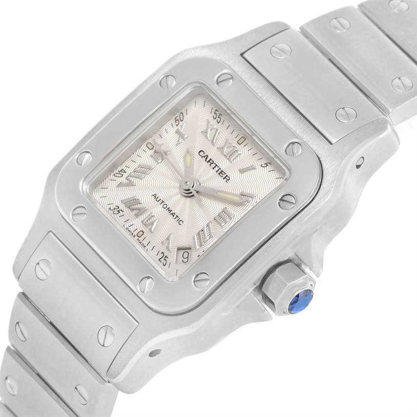 This image shows a close-up, angled view of the Cartier Santos W20044D6 Women's Stainless Steel Silver Dial W20044D6 Women's Stainless Steel Silver Dial watch, highlighting the face, bezel, and part of the bracelet.