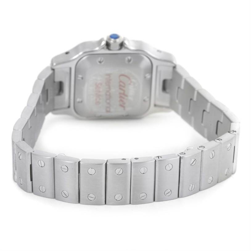 The image shows the back and bracelet of the Santos model by Cartier, including the links and clasp.