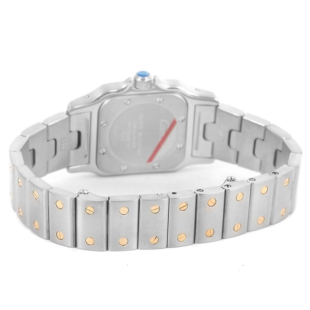 The image shows the back and bracelet of a Cartier Santos W20012C4 Women's Stainless Steel Silver Dial W20012C4 Women's Stainless Steel Silver Dial watch at an angle.