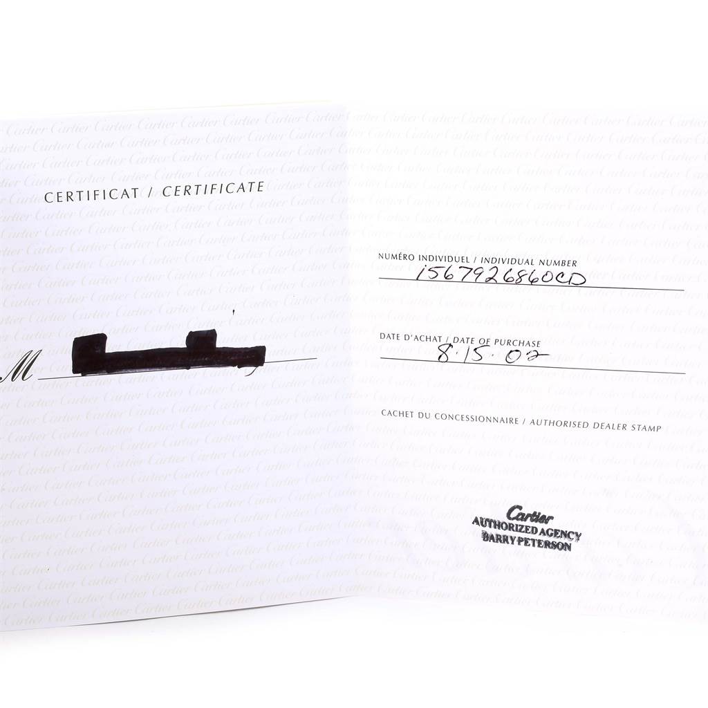 This image shows the certificate of authenticity and purchase information for a Cartier Santos W20012C4 Women's Stainless Steel Silver Dial W20012C4 Women's Stainless Steel Silver Dial model watch.