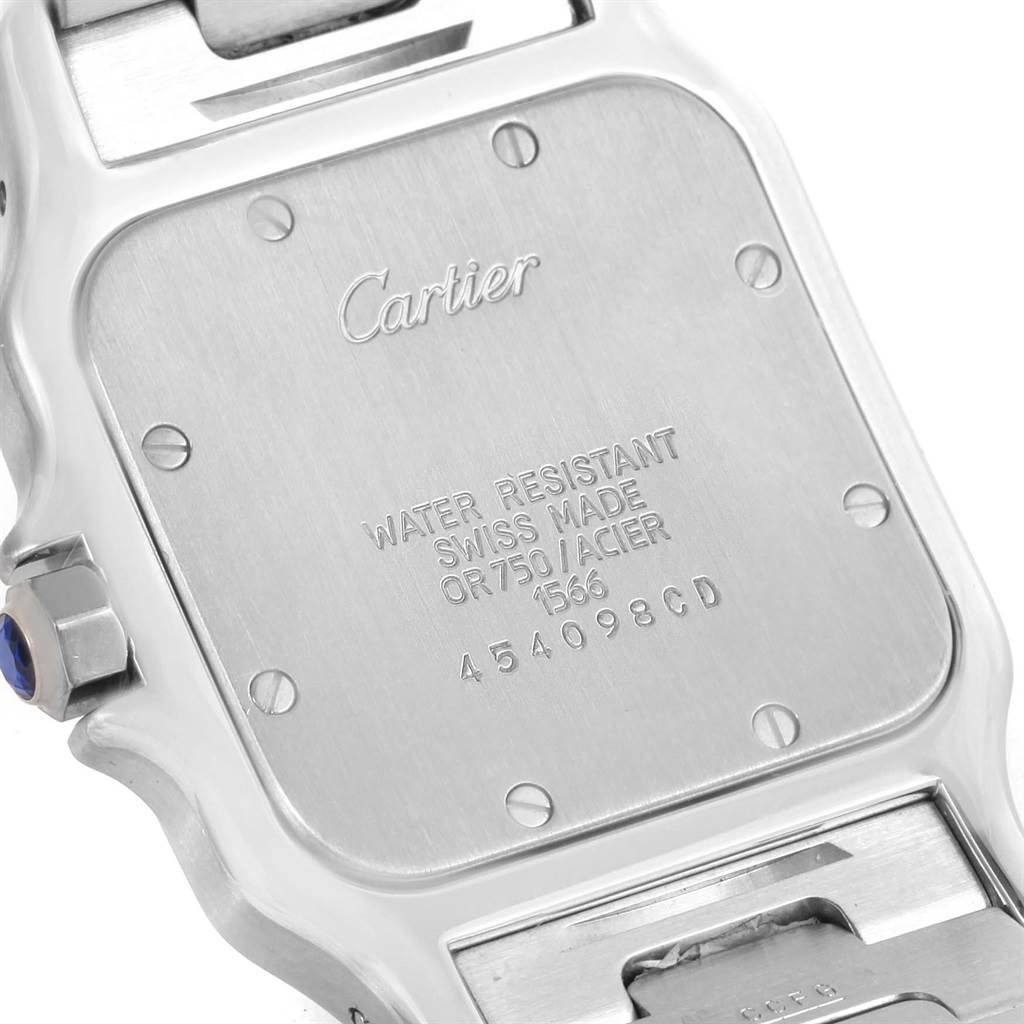This image shows the back case and part of the bracelet of a Santos model watch by Cartier.