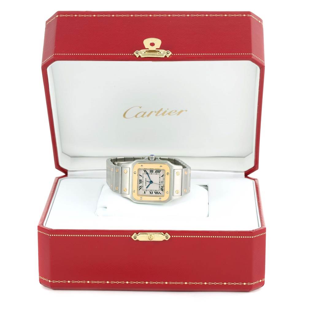 The Cartier Santos W20011C4 Stainless Steel Silver Dial W20011C4 Stainless Steel Silver Dial watch is shown from the front in its open red and white box.
