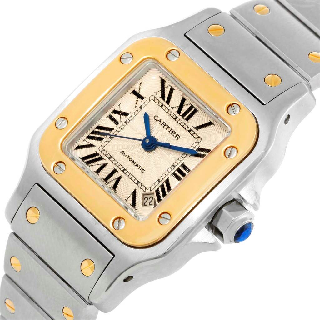 The image shows a Cartier Santos W20057C4 Women's Stainless Steel Beige Dial W20057C4 Women's Stainless Steel Beige Dial watch at an angled close-up, highlighting the face, bezel, crown, and part of the bracelet.