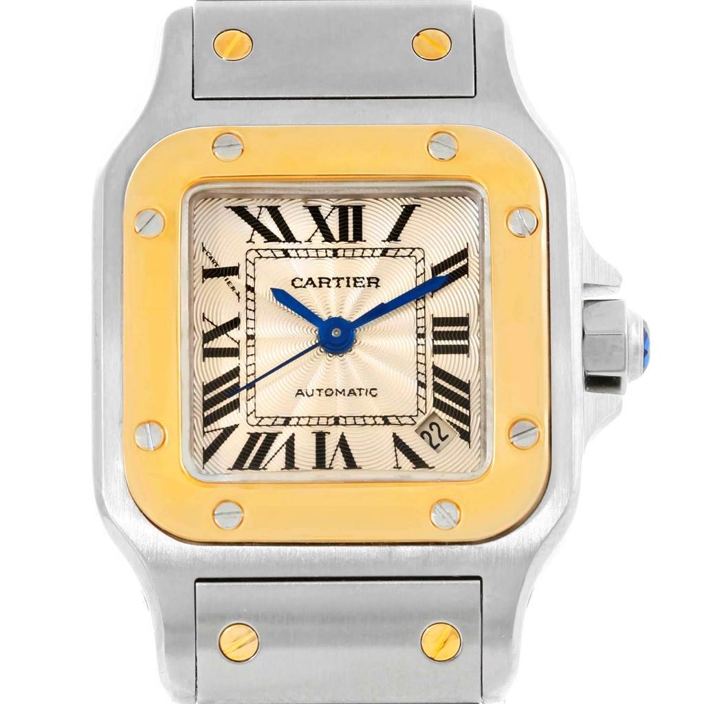 The image shows a front view of the Cartier Santos W20057C4 Women's Stainless Steel Beige Dial W20057C4 Women's Stainless Steel Beige Dial watch, highlighting its face, bezel, crown, and part of the bracelet.