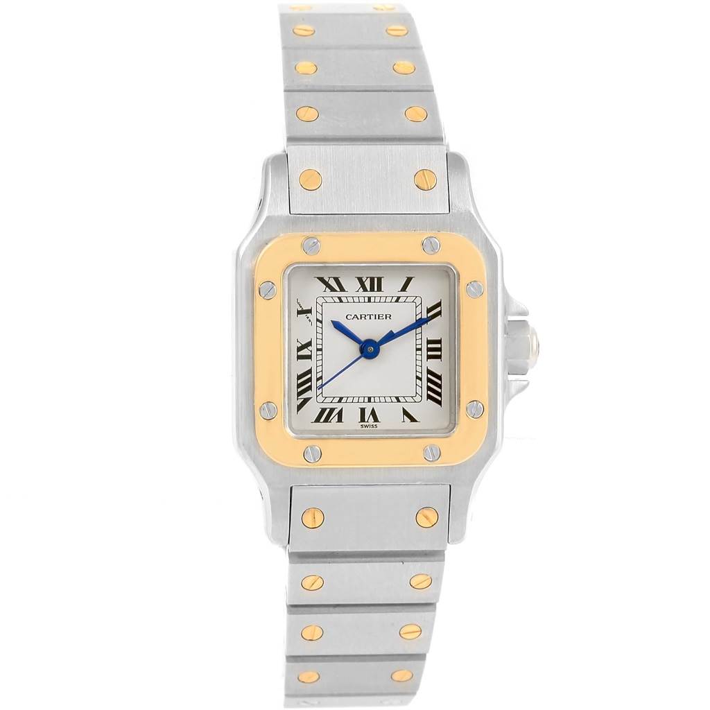 The Cartier Santos Women
s Stainless Steel Silver Dial Women
s Stainless Steel Silver Dial watch is shown from a front angle, highlighting its square dial, metal strap, and distinctive screws.