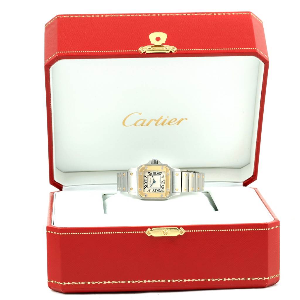 The Cartier Santos W20012C4 Women
s Stainless Steel Silver Dial W20012C4 Women
s Stainless Steel Silver Dial watch is shown from the front in an open red Cartier box.