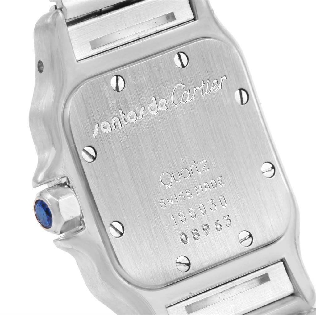 This image shows the case back of a Cartier Santos 166930 Women's Stainless Steel Silver Dial 166930 Women's Stainless Steel Silver Dial model watch, highlighting its Quartz movement and "Swiss Made" engraving.