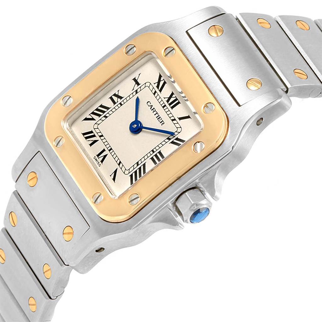 The image shows a Cartier Santos 1567 Women's Stainless Steel Silver Dial 1567 Women's Stainless Steel Silver Dial watch taken at an oblique angle, highlighting the dial, bezel, and part of the bracelet.