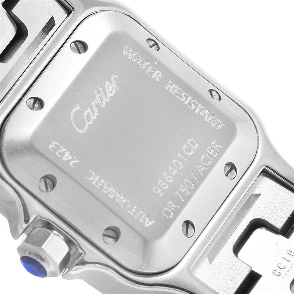 This image shows the back case and crown of the Cartier Santos W20057C4 Women's Stainless Steel Silver Dial W20057C4 Women's Stainless Steel Silver Dial watch.