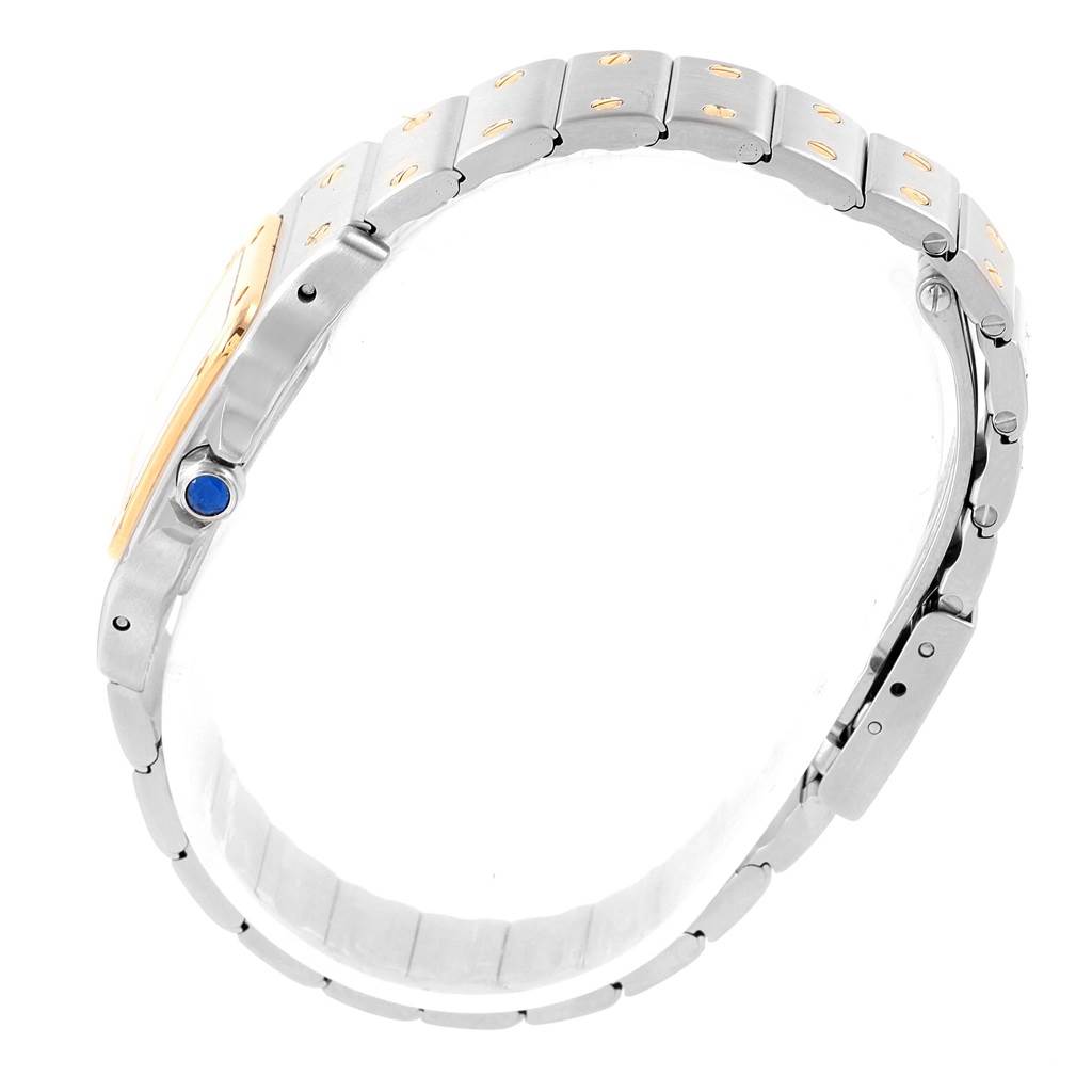 A side view of the Cartier Santos 1567 Women's Stainless Steel Silver Dial 1567 Women's Stainless Steel Silver Dial watch, showing the bracelet, clasp, and blue cabochon crown.