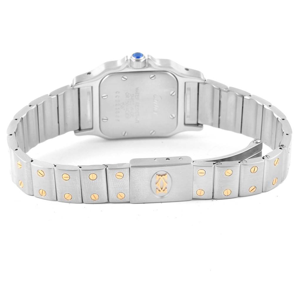 The image shows the back view of a Cartier Santos 1567 Women's Stainless Steel Silver Dial 1567 Women's Stainless Steel Silver Dial watch, highlighting its case back, crown, and two-tone bracelet.
