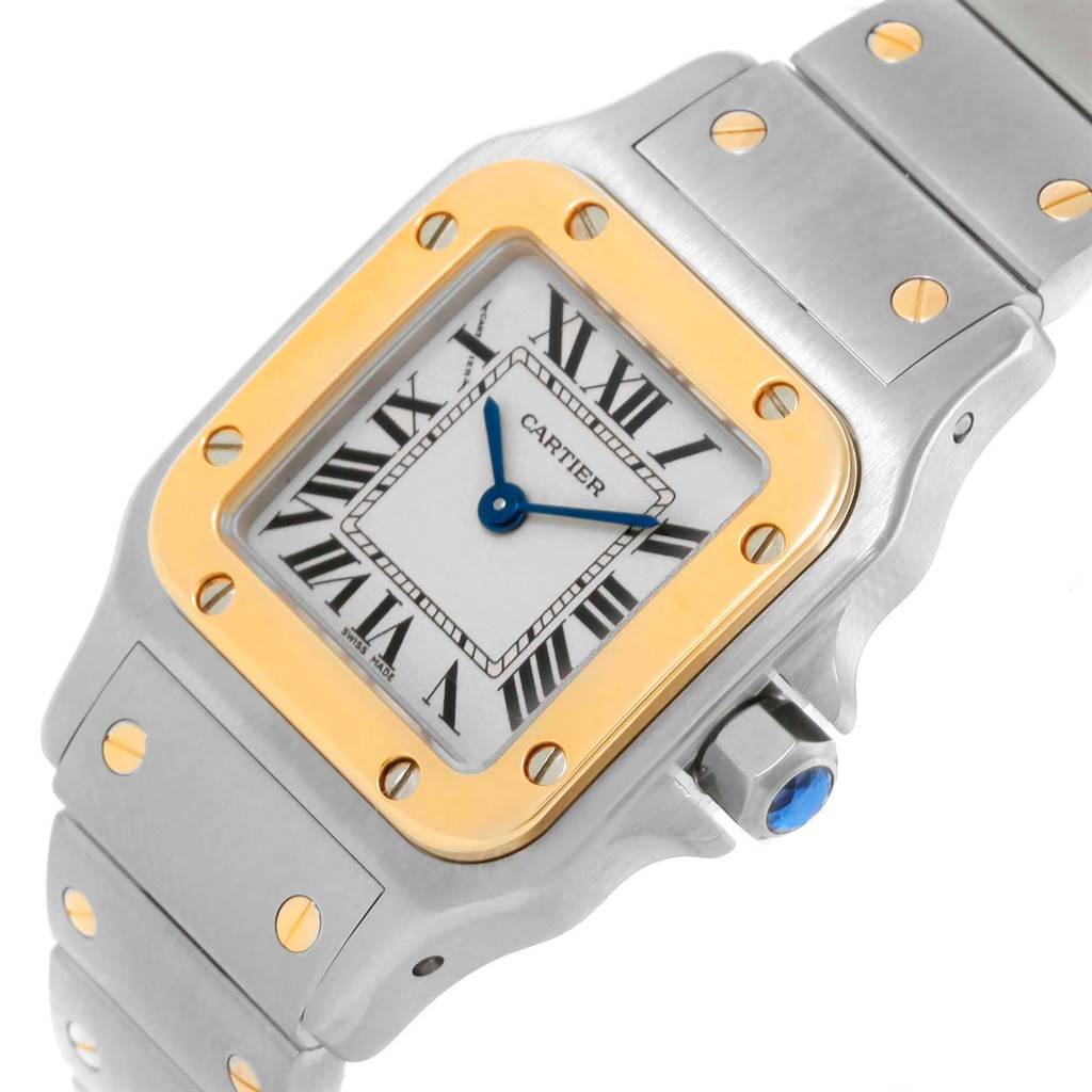 The image shows a Cartier Santos W20012C4 Women's Stainless Steel Silver Dial W20012C4 Women's Stainless Steel Silver Dial watch at an angle, highlighting the face, bezel, and part of the bracelet.