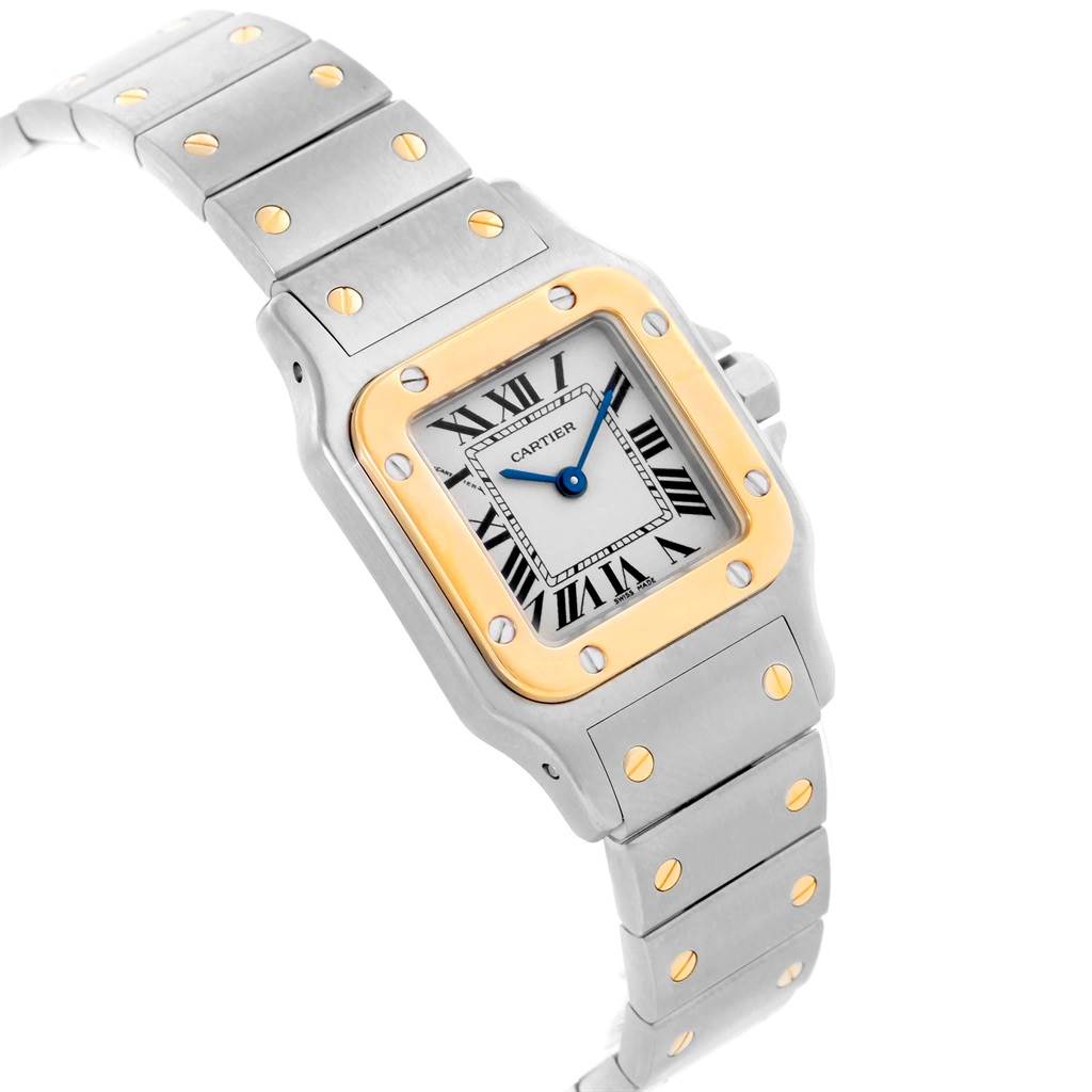 This image shows a Cartier Santos W20012C4 Women's Stainless Steel Silver Dial W20012C4 Women's Stainless Steel Silver Dial watch at a slight angle, highlighting its rectangular face, Roman numerals, and metal bracelet.