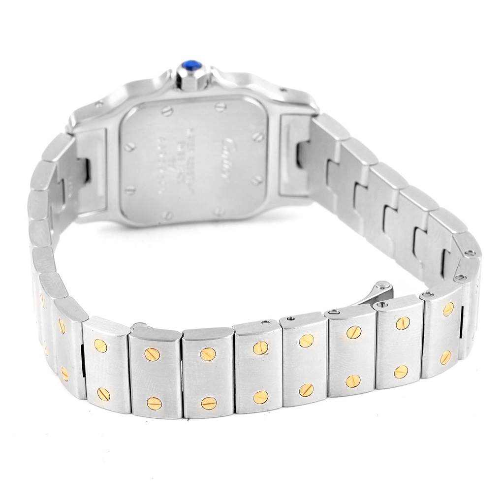 The image shows the back and bracelet of a Cartier Santos W20012C4 Women's Stainless Steel Silver Dial W20012C4 Women's Stainless Steel Silver Dial watch, including the case back and metal link bracelet with gold screws.