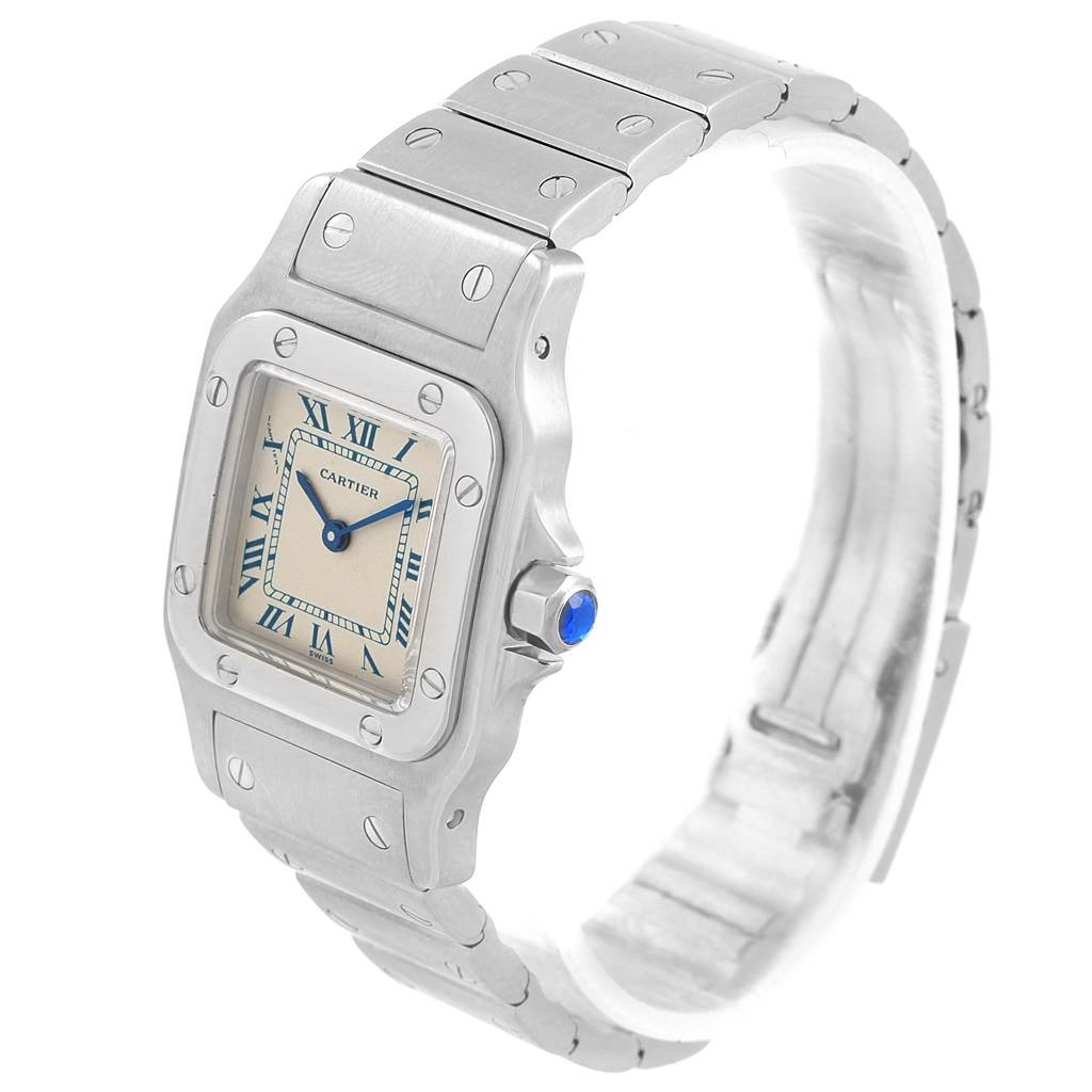 The image shows a Cartier Santos 07791 Women's Stainless Steel Silver Dial 07791 Women's Stainless Steel Silver Dial watch from a front angle, highlighting its square dial, Roman numerals, and metal bracelet.