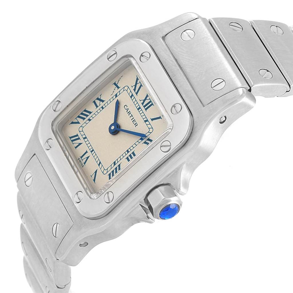 The Cartier Santos 07791 Women's Stainless Steel Silver Dial 07791 Women's Stainless Steel Silver Dial watch is shown in a three-quarter angle, highlighting the face, bezel, and part of the bracelet.