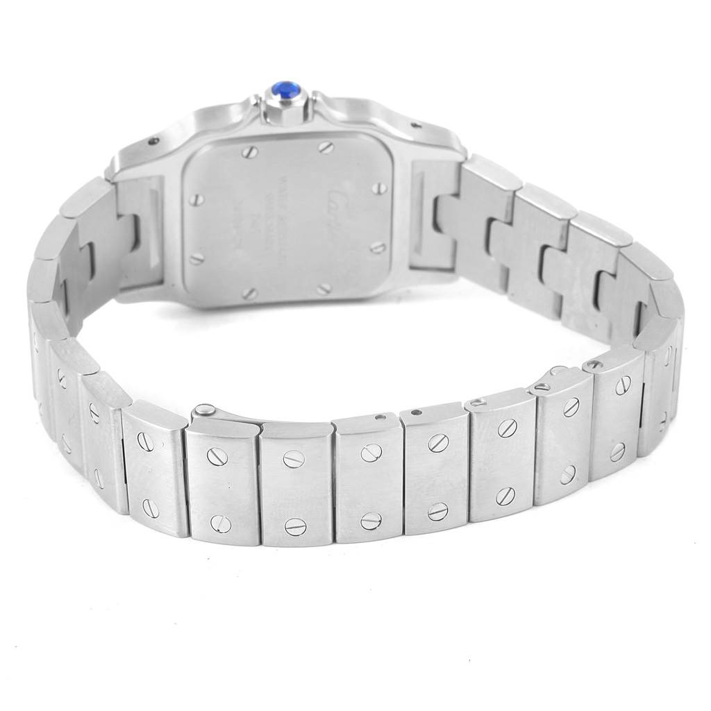 This image shows the back view of a Santos model Cartier watch, highlighting its case and metal bracelet.